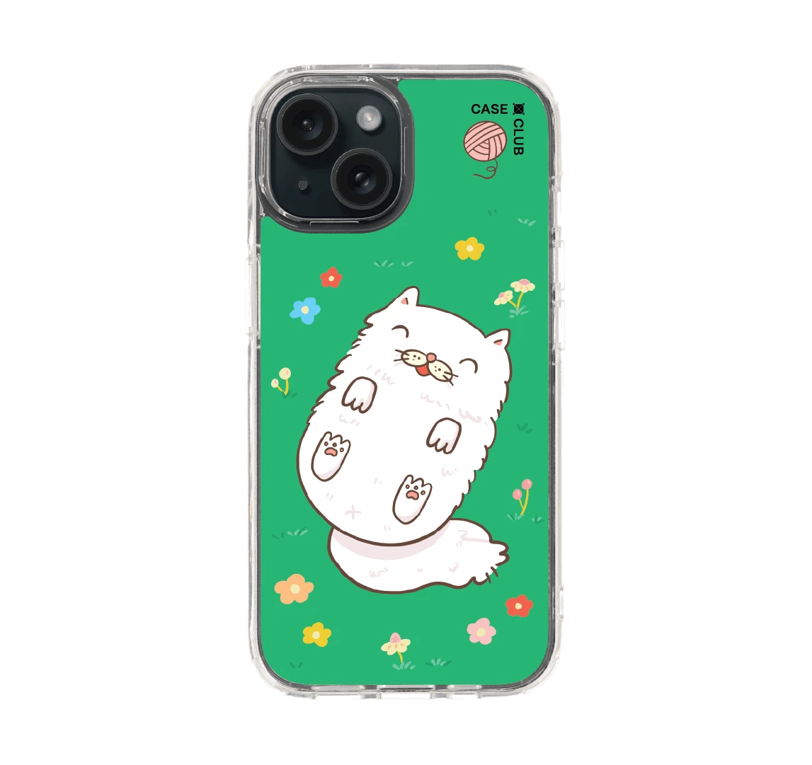 แมวเปอร์เซียในสวนดอกไม้สีเขียว